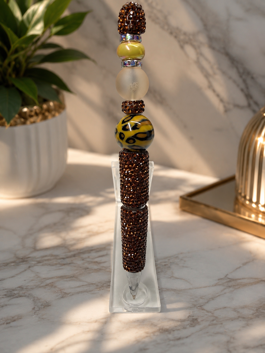 Brown pen with animal print focal bead