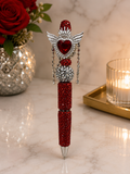 Red beaded pen with heart