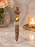 Gold pen with gold heart
