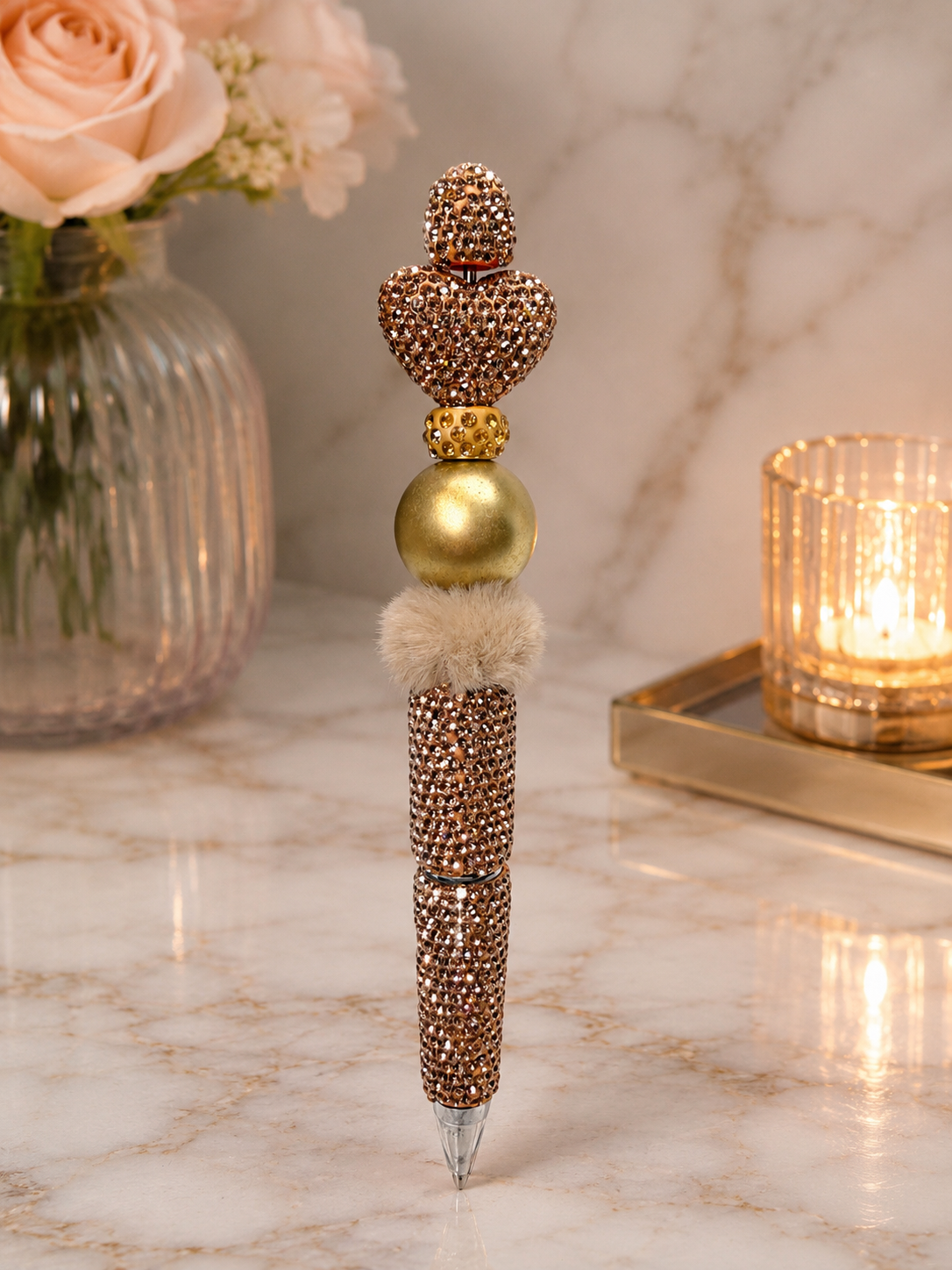 Gold pen with gold heart