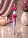 Pink ink pen with furry focal bead