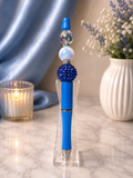 Blue ink pen with royal blue focal bead