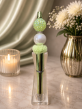 Green chrome ink pen with green beaded focal bead
