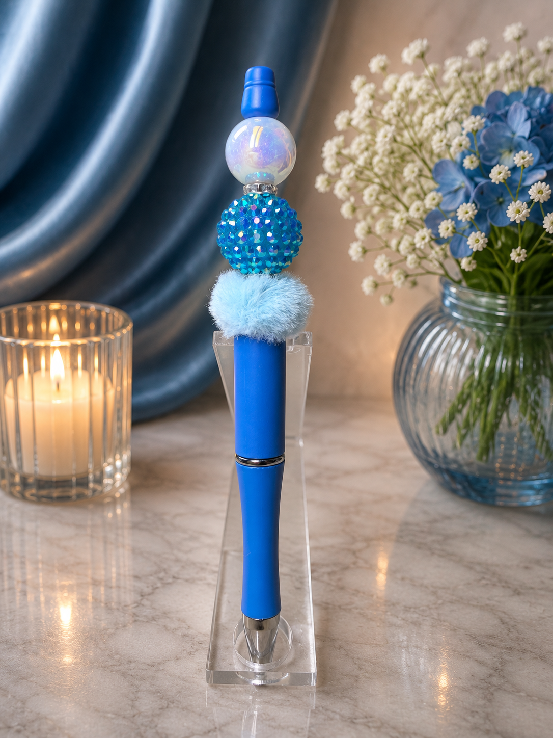 Blue ink pen with glitter focal bead