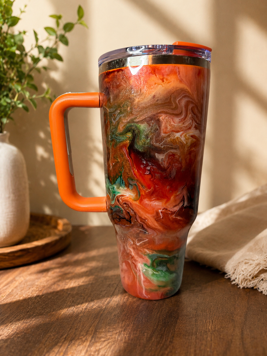 40oz Orange and teal insulated tumbler