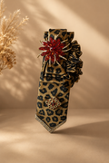 Leopard necktie with red brooch